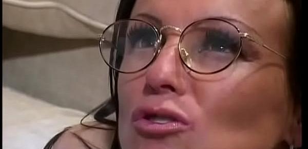 Brunette receives a ton of jizz on her nerdy glasses